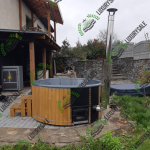 Спа купель «Лакшері 12 гідро» із сосни біля заміського будинку